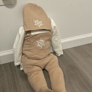 Brand new no tags maniere footie with hat size 6m